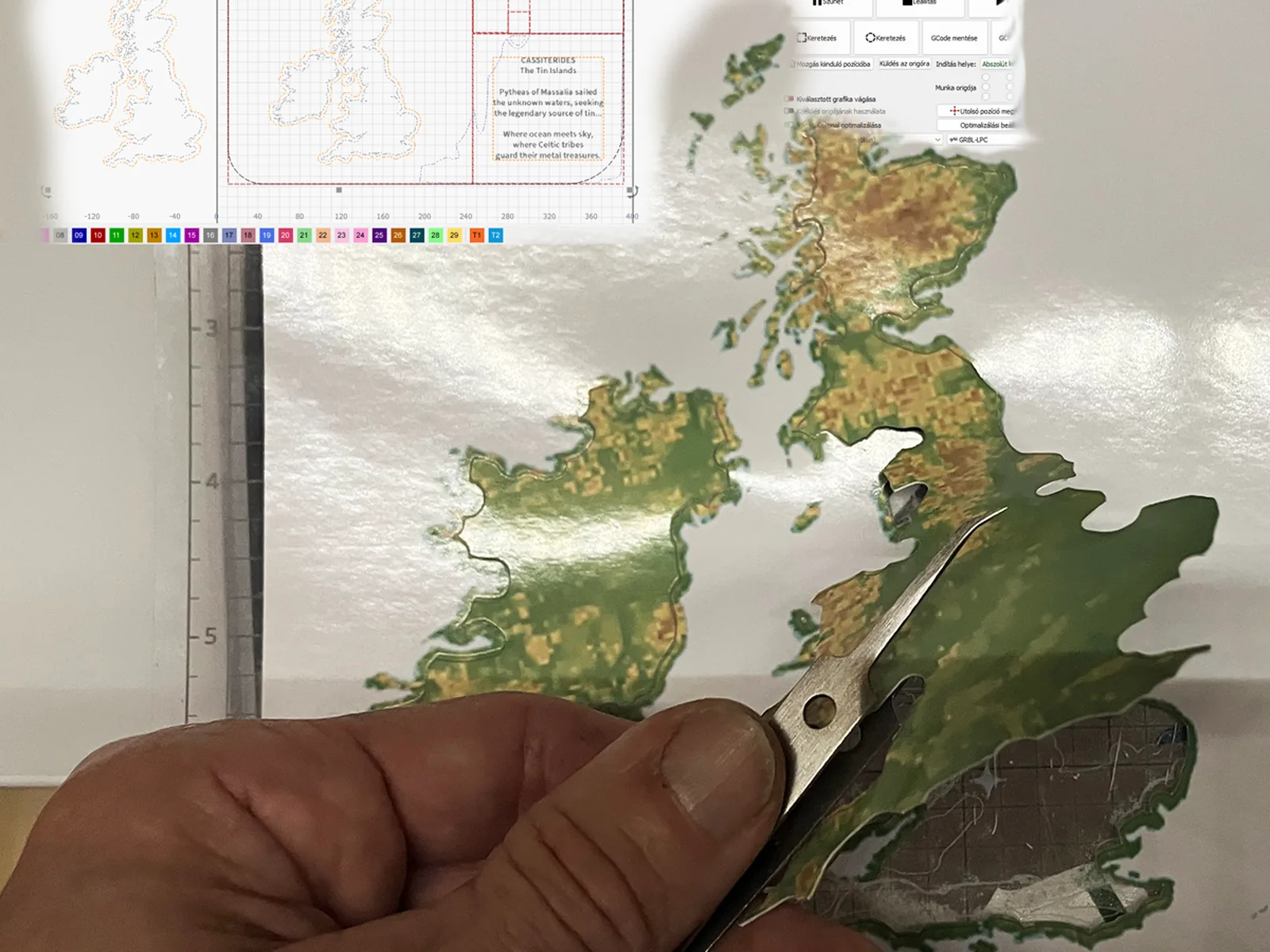 Hand-cutting a relief map of the British Isles in the studio
